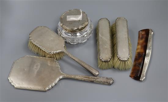 A 1930s matched silver six piece dressing table set, Alexander Clark & Co and Adie Bros, Birmingham, 1934/5.